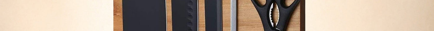 Personalized wooden magnetic knife block holding chef knives and kitchen scissors