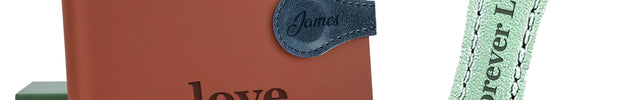 A collection of personalized magnetic bookmarks in various colors, each featuring a custom engraved name. They are displayed alongside a book with a visible title 'The love letter' and a sample bookmark with the name 'Olivia' engraved on it.