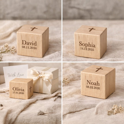 Set of wooden boxes with engraved names and dates on a textured surface.