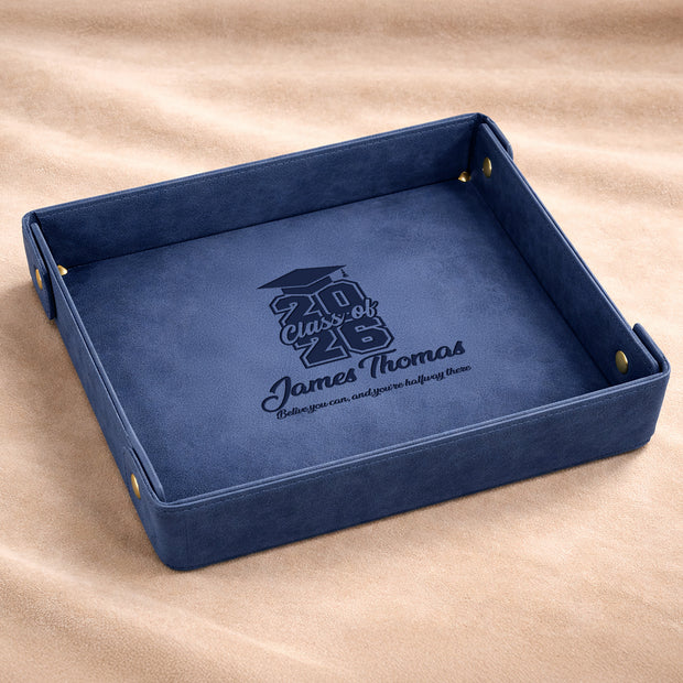 Blue tray with personalized design on a beige fabric background