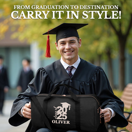 Graduate in cap and gown holding a black bag with 'Class of 2025 Oliver' text, outdoors.

