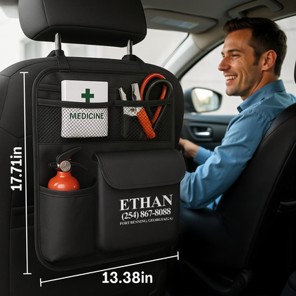 Car organizer with compartments and a man sitting in the car, with dimensions displayed.