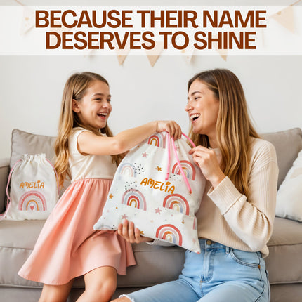 Woman and child holding bags with 'Amelia' printed on them, sitting on a couch.