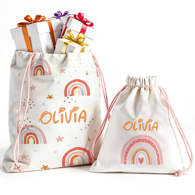 Two drawstring bags with rainbow patterns and 'Olivia' printed on them, accompanied by small gift boxes with colorful ribbons.