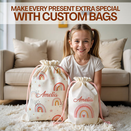 Girl with personalized bags featuring rainbow designs and the name 'Amelia' in a living room setting.