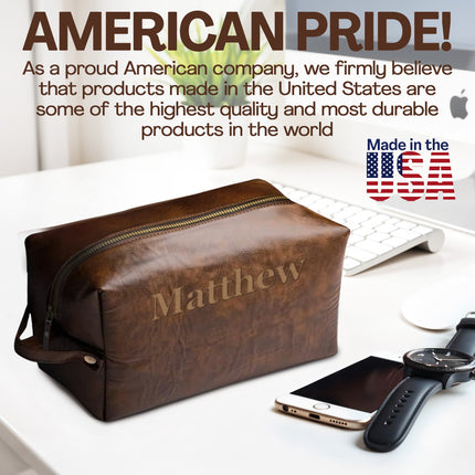 Brown leather toiletry bag with 'Matthew' engraved, placed on a desk with a phone and watch, with text about American pride and products made in the USA.