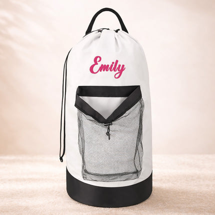 White drawstring bag with black mesh pocket and 'Emily' in pink text on a beige background