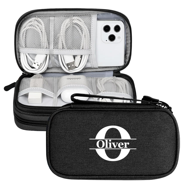 Black travel case with 'Oliver' branding containing electronic accessories on a white background