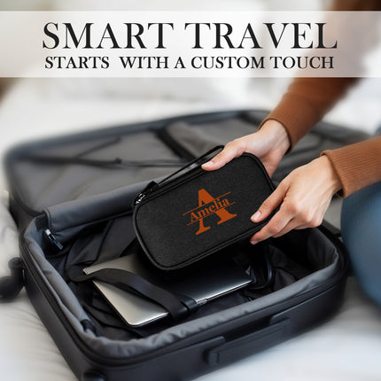 Person placing a black travel pouch with 'Ania' logo into an open suitcase, with text 'Smart Travel Starts With A Custom Touch'.