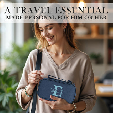 Woman holding a blue travel essential bag with 'Emma' branding in a home setting.