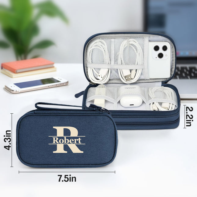 Navy blue travel case with 'Robert' branding, containing electronic accessories, on a white surface with measurements displayed.