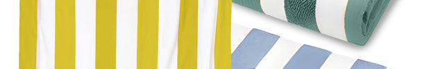 Two personalized beach towels with custom names. One towel is yellow with green stripes and the name 'Amelia' embroidered in red, and the other is blue with white stripes and the name 'William' embroidered in red.

