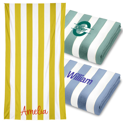 Two personalized beach towels with custom names. One towel is yellow with green stripes and the name 'Amelia' embroidered in red, and the other is blue with white stripes and the name 'William' embroidered in red.

