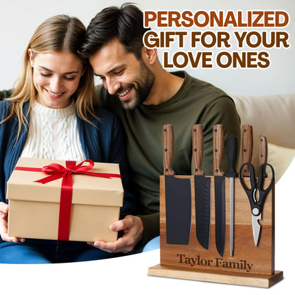 Wooden knife block set with knives and scissors on a white background
