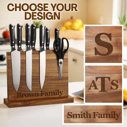 Wooden knife block set with knives and scissors on a white background