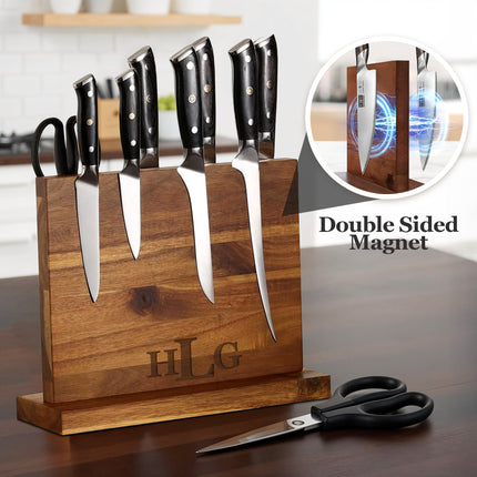 Wooden knife block set with knives and scissors on a white background