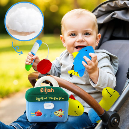 Child playing with a toy tackle box and fishing rod in a stroller, with a close-up of the tackle box label.