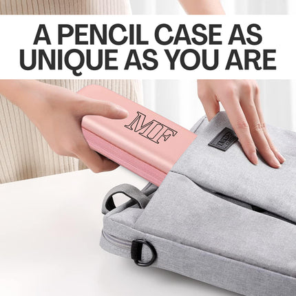Two pencil cases, one pink and one gray, with text 'A PENCIL CASE AS UNIQUE AS YOU ARE' above them.