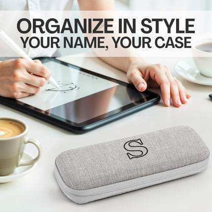 Gray case with a monogram on a desk with a tablet and coffee cups, text 'Organize in Style Your Name, Your Case'.