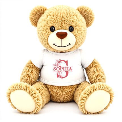 Plush teddy bear wearing a white shirt with 'SOPHIA' printed on it against a white background